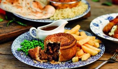 Pie with chips and gravy